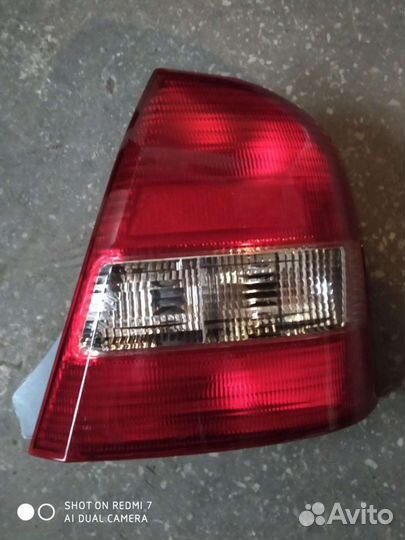 Фонарь задний Мазда Фамилия 98-04 правый,левый