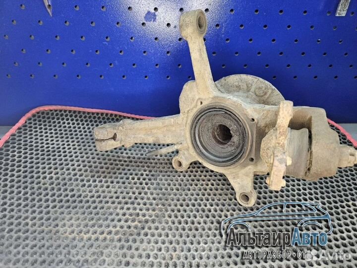 Передний левый поворотный кулак Kia Sportage 1