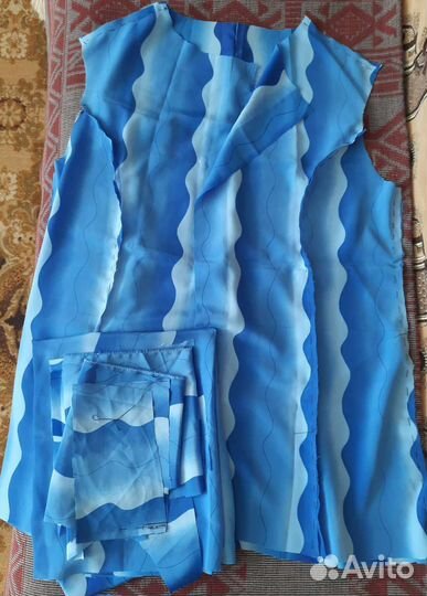 Ткань новая голубая волнами