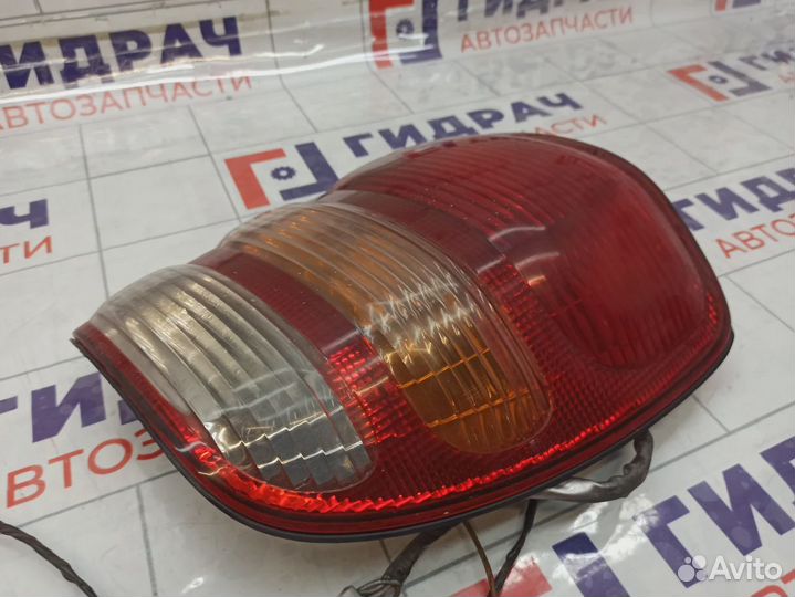 Фонарь задний наружный левый Toyota Land Cruiser (J100) 81560-60480