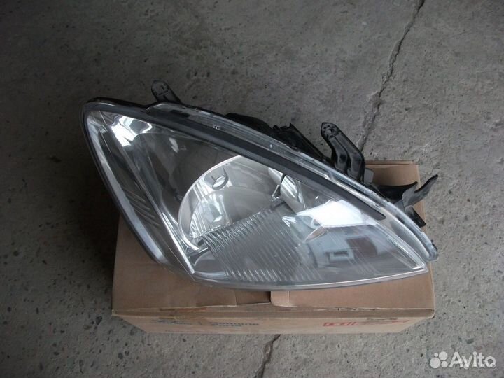 Фара правая Mitsubishi Lancer