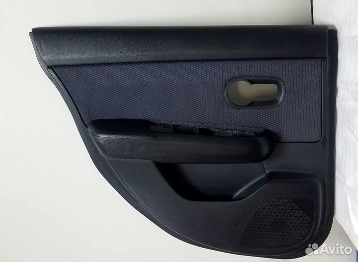 Стекло задней левой двери Nissan Tiida