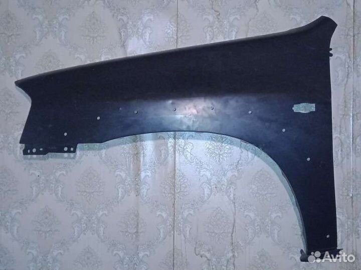Крыло переднее левое с отверстиями мазда трибьют