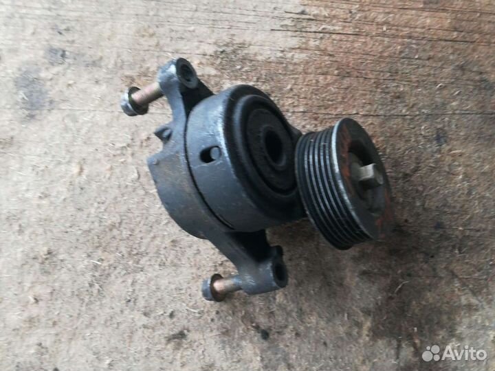 Натяжитель ремня генератора mazda demio DY5W