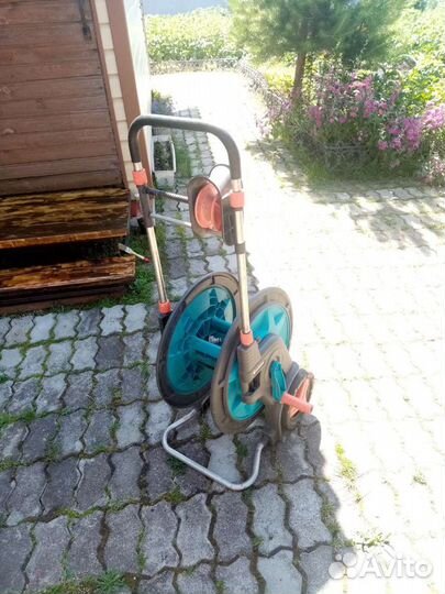 Катушка для поливочного шланга