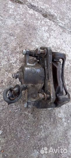 Суппорт передний левый Kia Soul, 58180-K0A50