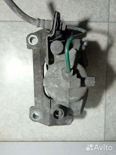 Суппорт тормозной передний левый Renault Laguna 2