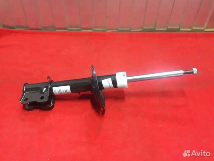 Амортизатор передний левый Опель Мерива А