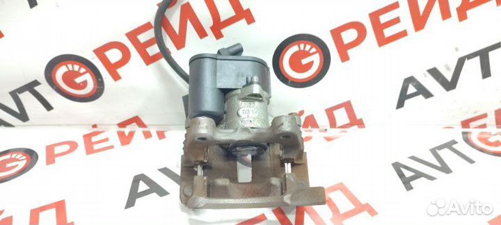 Суппорт тормозной задний левый Volkswagen Tiguan