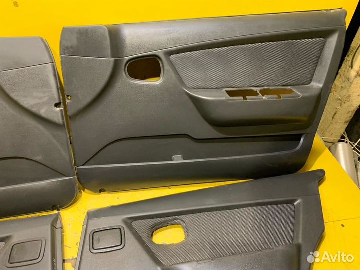 Обшивка двери Daewoo Nexia 2008-2016