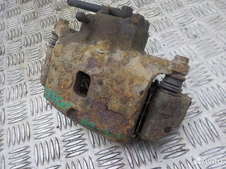 Суппорт тормозной передний правый Mitsubishi Lance