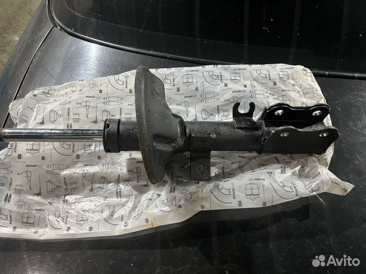 Стойки передние Kia Spectra