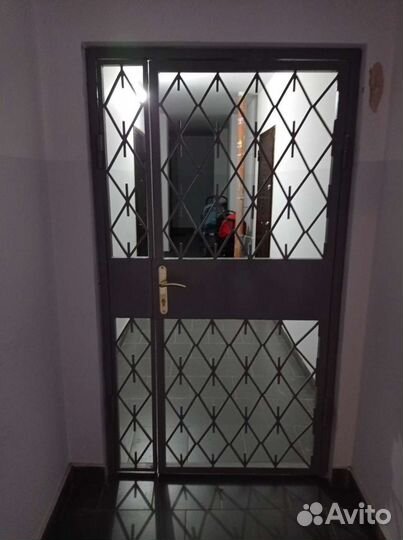 Дверь металлическая решëтка