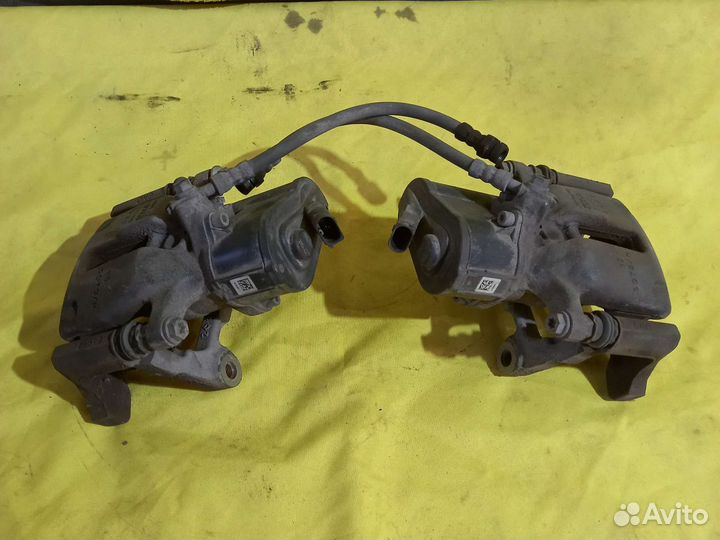 Суппорт задний электро Vw Passat Tiguan