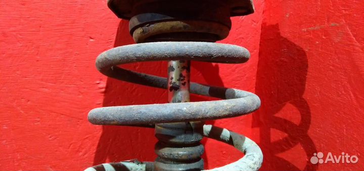 Калина стойка передняя левая пружина конус с деф