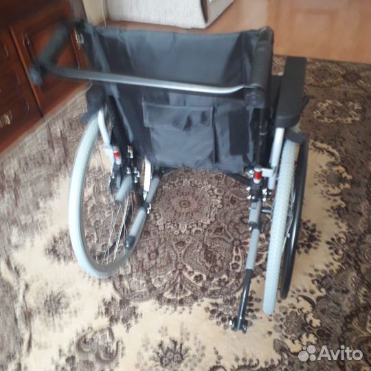 Инвалидная коляска