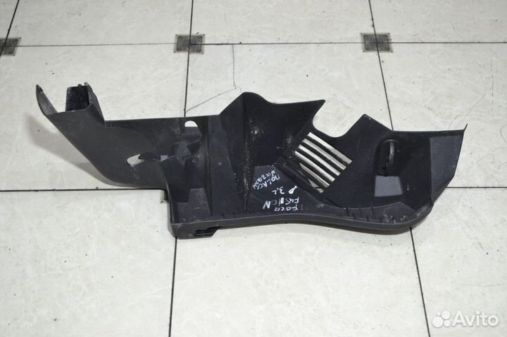 Обшивка багажника левая Ford Fusion