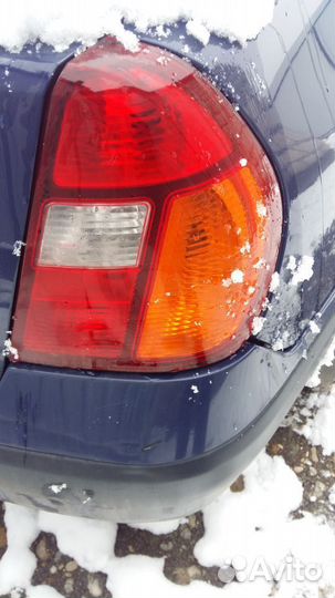 Задний правый фонарь рено клио симбол