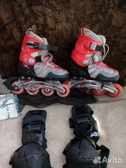Роликовые коньки
