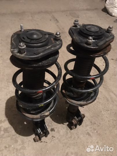Передние амортизаторы в сборе Toyota Avensis T250