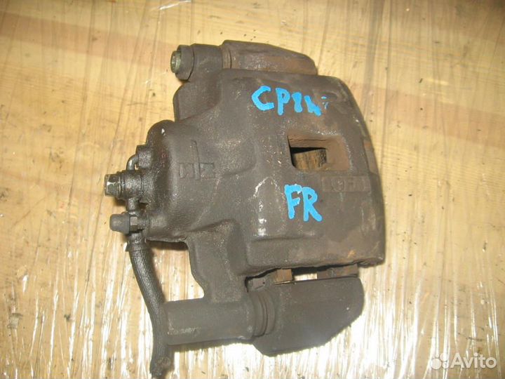 Суппорт перед право Mazda CP8W Familia '00-'04/ Ca