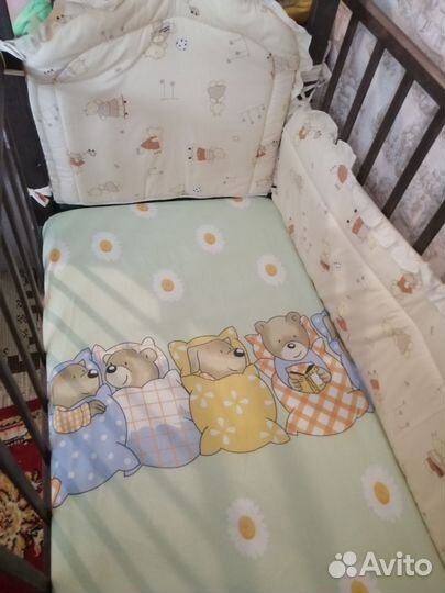 Детская кроватка с продольным маятником