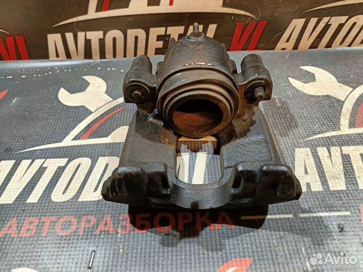 Суппорт тормозной передний Ford Focus седан zetec