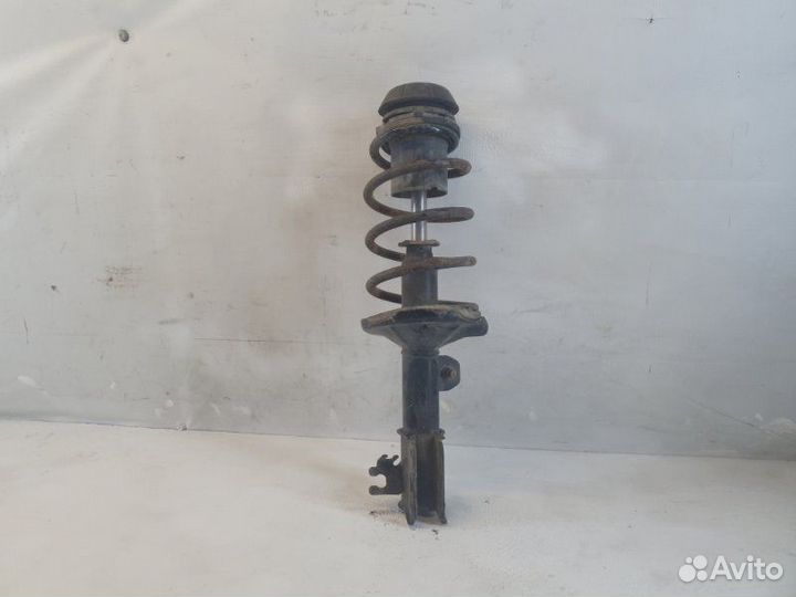 Амортизатор передний левый Chevrolet Lacetti J200