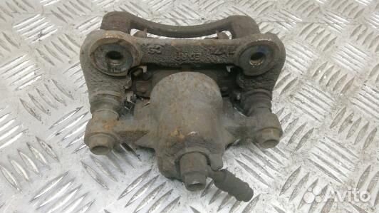 Суппорт тормозной задний левый KIA CEE'D 1 (NBR03L