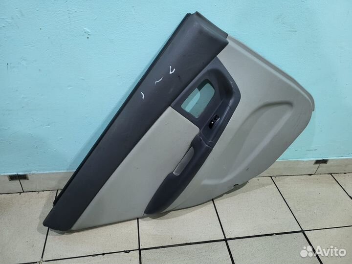 Обшивка двери задняя левая Kia Cerato 1