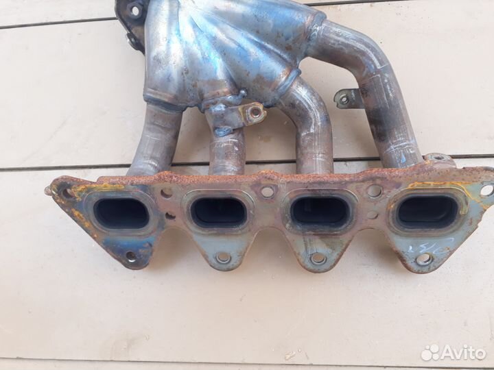 Коллектор выпускной Nissan Almera G15