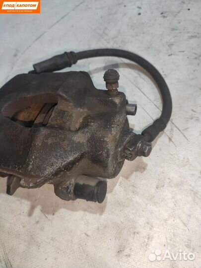 Суппорт тормозной передний правый Volkswagen Golf