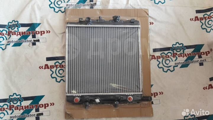 Радиатор mazda demio/323/ford festiva 96-00 1 верх