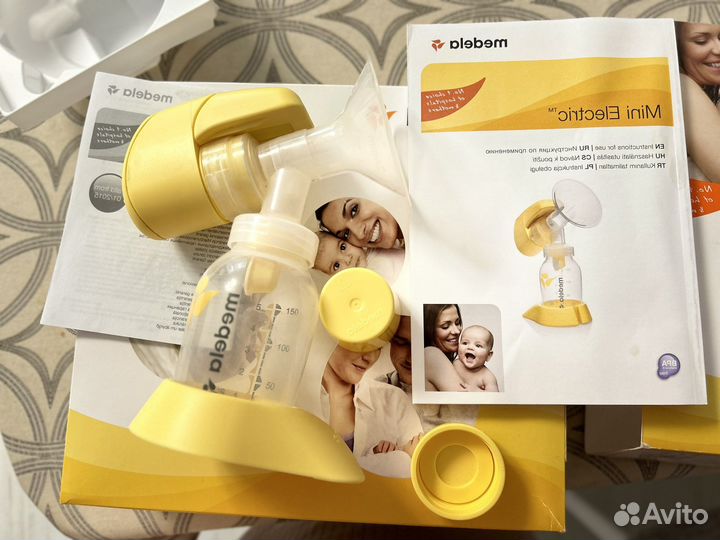 Молокоотсос medela электрический