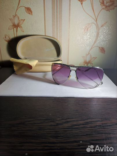Солнцезащитные очки женские брендовые