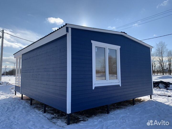 Дачная каркасная бытовка с террасой