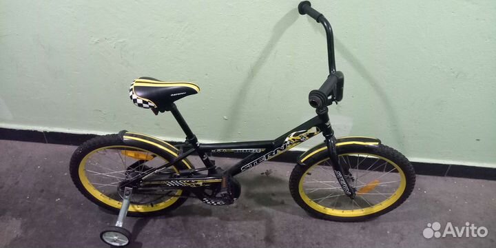 Детский велосипед бу с дополнительными колесмами