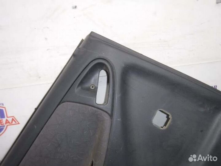 Обшивка двери задняя левая Toyota Vitz 1szfe 1999