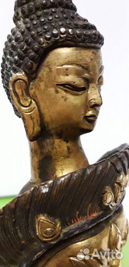 Старинная статуэтка будды
