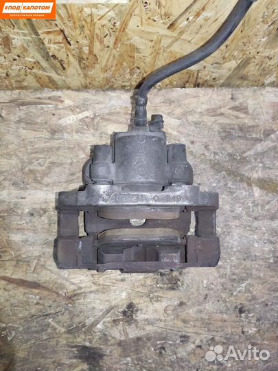 Суппорт тормозной задний левый BMW X5 E70