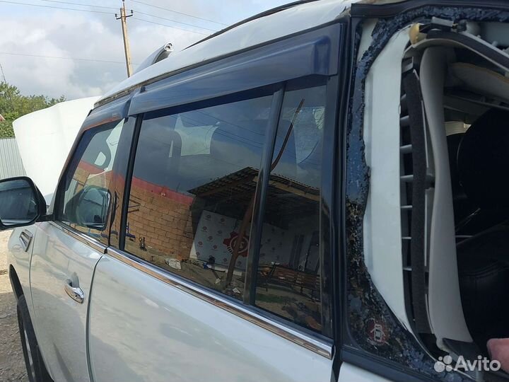 Nissan Patrol Y62 стекло левое задняя