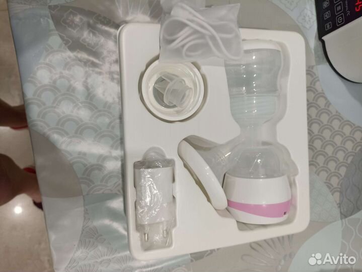 Молокоотсос электрический новый