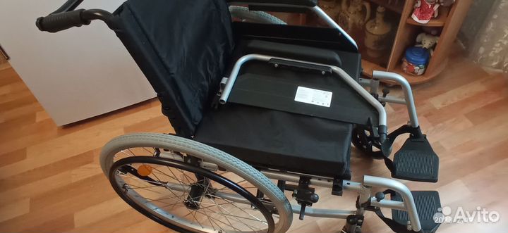 Инвалидная коляска