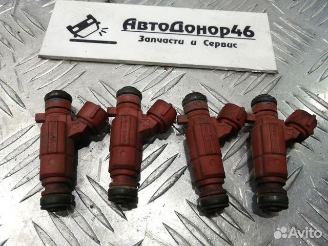 Форсунка топливная QG15, 1.5L Ниссан Альмера