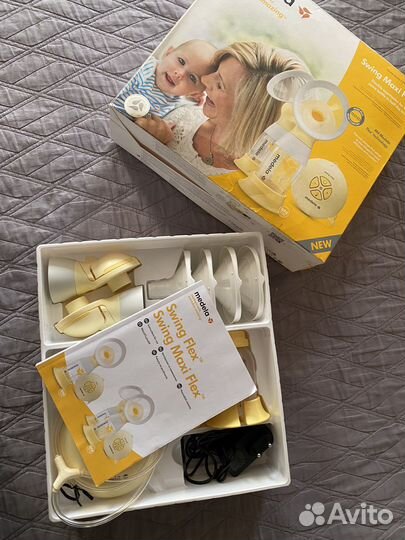 Молокоотсос medela swing maxi flex