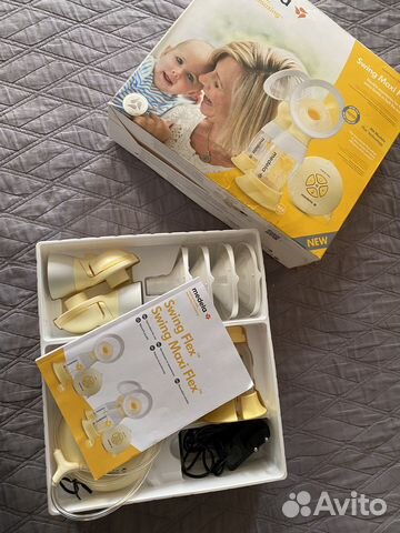 Молокоотсос medela swing maxi flex