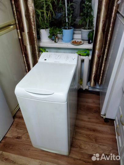 Вертикальная стиральная машинка Ariston At84