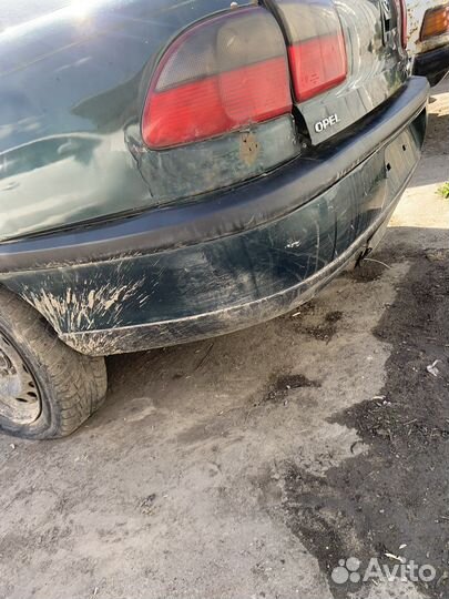 Бампер задний Opel Omega B
