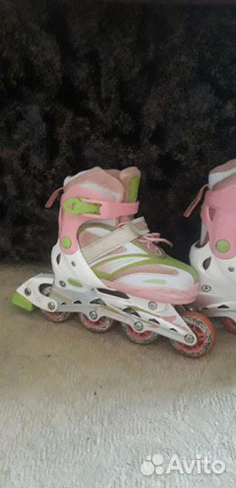 Роликовые коньки