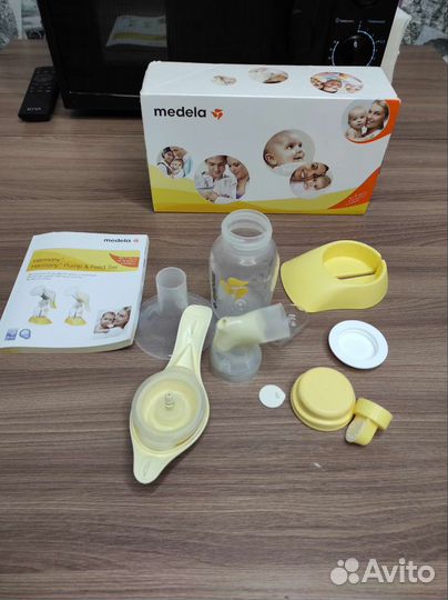 Молокоотсос medela ручной